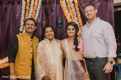 Sweet Indian couple with parents capture. Sweet Indian couple with parents capture.