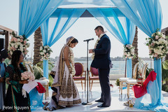 Indian groom saying his bows to bride. Indian groom saying his bows to bride.