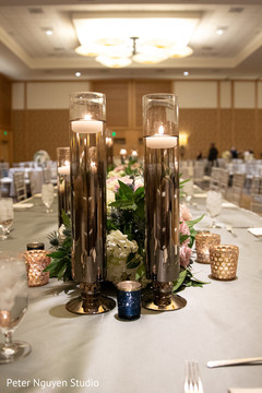 Elegant Indian wedding reception table candle holders. Elegant Indian wedding reception table candle holders.