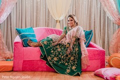 Enchanting Indian bride posing with her mehndi art. Enchanting Indian bride posing with her mehndi art.