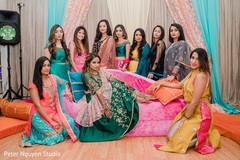 Indian bride and bridesmaids posing for a photo shoot. Indian bride and bridesmaids posing for a photo shoot.