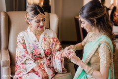 Enchanting Indian bride getting her ceremony jewelry on. Enchanting Indian bride getting her ceremony jewelry on.