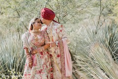 Indian groom kissing the bride capture. Indian groom kissing the bride capture.
