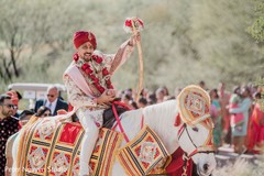 Cheerful Indian groom at his baraat outdoors photography. Cheerful Indian groom at his baraat outdoors photography.