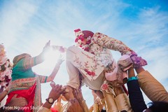Maharani putting baraat garland to groom. Maharani putting baraat garland to groom.