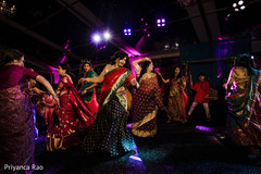 Beautiful Indian guests performing a choreography at the reception Beautiful Indian guests performing a choreography at the reception