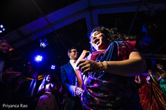 Indian wedding guests having an amazing time at the reception Indian wedding guests having an amazing time at the reception