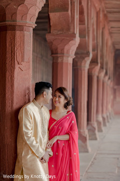 Smiling lovebirds posing for pictures Smiling lovebirds posing for pictures