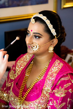Beautiful Indian bride being dolled up for her ceremony. Beautiful Indian bride being dolled up for her ceremony.