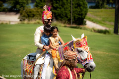 Indian groom riding the ghodi with kids Indian groom riding the ghodi with kids