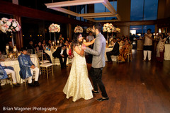 Indian groom and bride having their first dance Indian groom and bride having their first dance