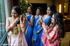 Indian bridesmaids taking pictures of Maharani. Indian bridesmaids taking pictures of Maharani.