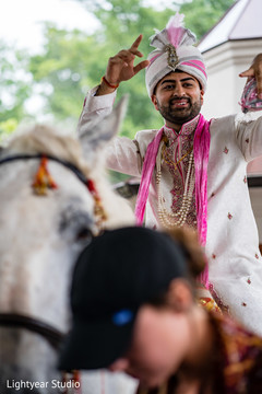 Indian groom with white baraat horse. Indian groom with white baraat horse.