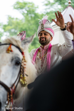 Indian groom riding baraat white horse. Indian groom riding baraat white horse.