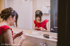 Indian bride getting her makeup done. Indian bride getting her makeup done.