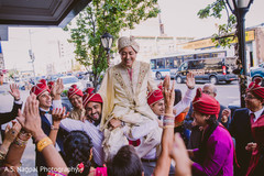 Rajah being lifted by groomsmen at baraat. Rajah being lifted by groomsmen at baraat.