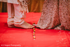 Indian bride and groom at the Saptapadi ritual. Indian bride and groom at the Saptapadi ritual.