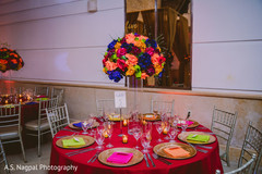 Marvelous Indian wedding table flowers and candle decoration. Marvelous Indian wedding table flowers and candle decoration.