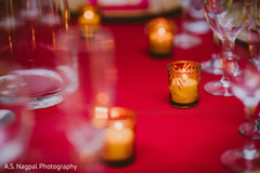 Lovely Indian wedding table candles decoration. Lovely Indian wedding table candles decoration.