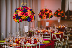 Delightful Indian wedding reception table centerpiece decor. Delightful Indian wedding reception table centerpiece decor.