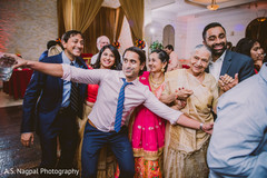 Cheerful Indian wedding reception dance. Cheerful Indian wedding reception dance.