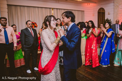 Indian bride and groom magical first dance scene. Indian bride and groom magical first dance scene.