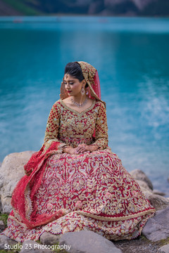 Indian bride posing with her amazing lengha Indian bride posing with her amazing lengha