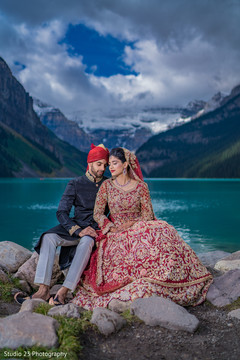 Amazing shot of Indian couple by the waters Amazing shot of Indian couple by the waters