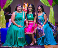 Beautiful Indian bride posing with special guests Beautiful Indian bride posing with special guests