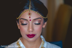Dazzling Indian bride showing her make up Dazzling Indian bride showing her make up