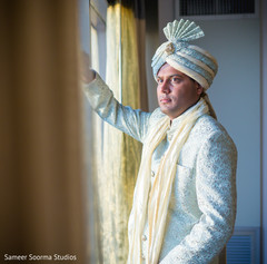 Indian groom looking through the window Indian groom looking through the window