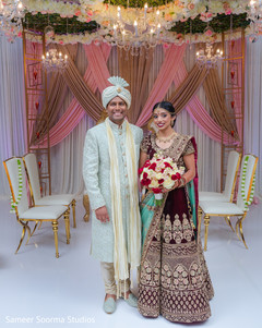 Maharani and Raja posing by the decor Maharani and Raja posing by the decor