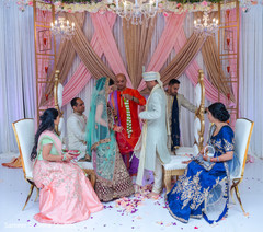 Indian bride and groom during a moment of the ritual Indian bride and groom during a moment of the ritual