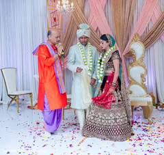 Indian couple reading the vows Indian couple reading the vows