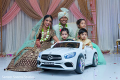Lovely shot of Indian couple with kid guests Lovely shot of Indian couple with kid guests