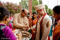 Indian groom being blessed at the baraat rituals. Indian groom being blessed at the baraat rituals.
