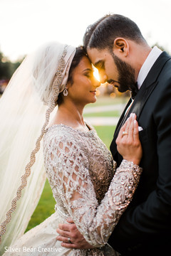 Sweet and lovely Indian bride's and groom's first look scene. Sweet and lovely Indian bride's and groom's first look scene.