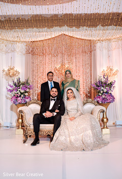 Indian lovebirds posing with parents. Indian lovebirds posing with parents.
