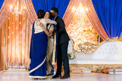 Special guest hugging the newlyweds Special guest hugging the newlyweds