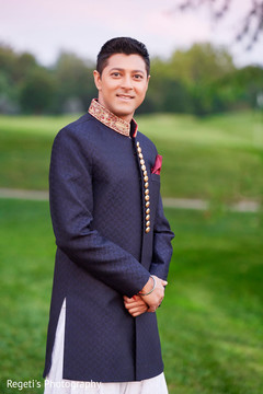 Elegant Indian groom posing for photo shoot Elegant Indian groom posing for photo shoot
