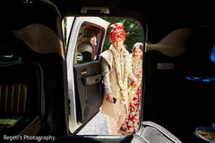 Indian couple going into the car Indian couple going into the car