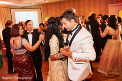 Guests and newlyweds dancing Guests and newlyweds dancing
