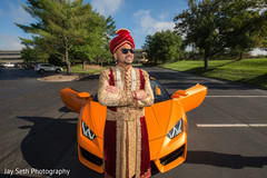Elegant Indian groom riding baraat vehicle. Elegant Indian groom riding baraat vehicle.