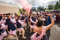Indian groom with groomsmen at baraat dance. Indian groom with groomsmen at baraat dance.