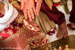 Indian wedding ritual where couple throw the rice onto sacred fire. Indian wedding ritual where couple throw the rice onto sacred fire.