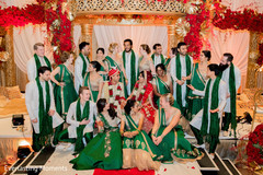 Indian bride and groom posing with bridesmaids and groomsmen. Indian bride and groom posing with bridesmaids and groomsmen.