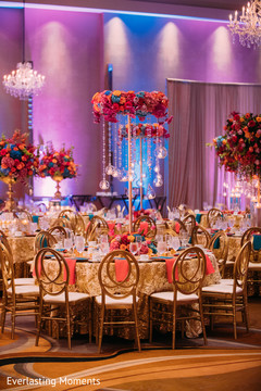Magnificent Indian wedding table flowers and candles decor. Magnificent Indian wedding table flowers and candles decor.