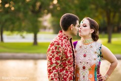 Indian bride and groom having a tender moment Indian bride and groom having a tender moment