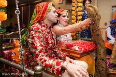 Indian bride and groom having a blast during the pre wedding rituals Indian bride and groom having a blast during the pre wedding rituals