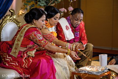 Indian bridal making offerings to sacred fire. Indian bridal making offerings to sacred fire.